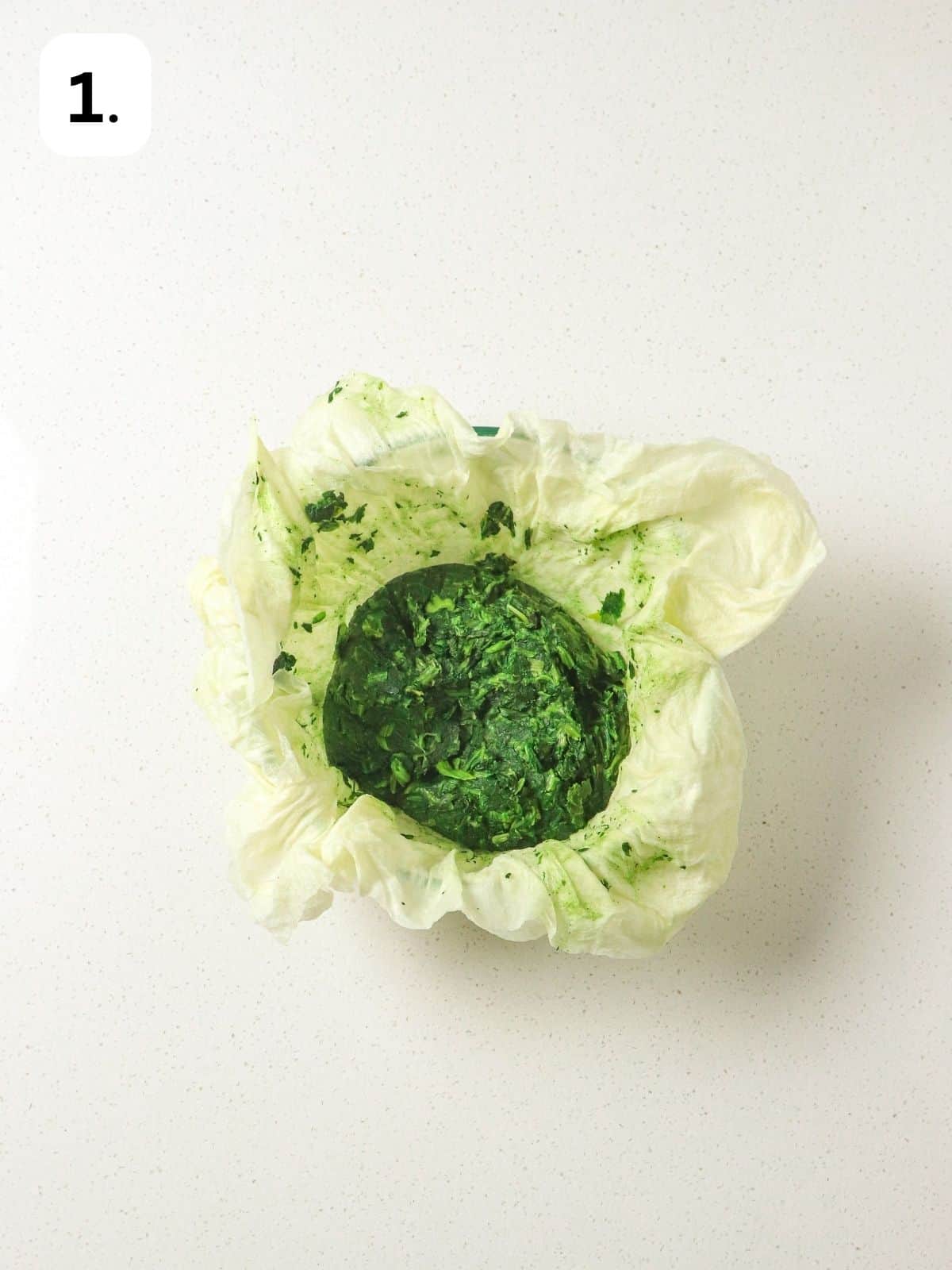 Green frozen vegetable in napkin