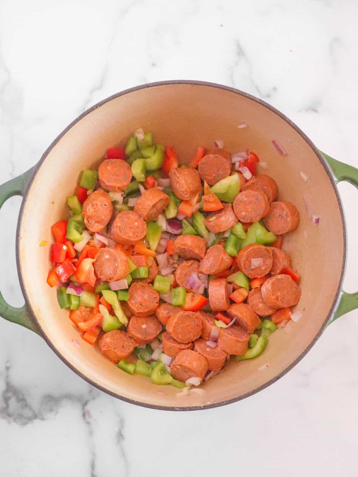 sausage and vegetables in pan