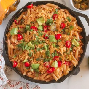 Cast Iron Skillet with vegetables, chips and pasta