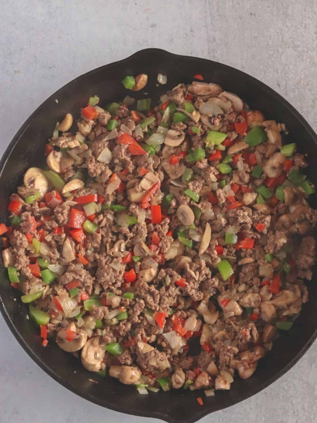 impossible meat, bell peppers, mushrooms and onion