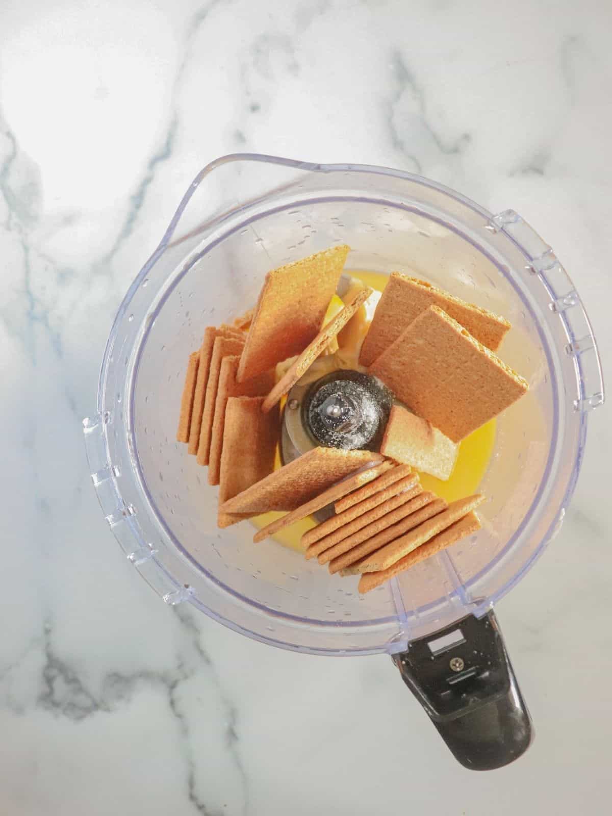 crackers and butter in food processor