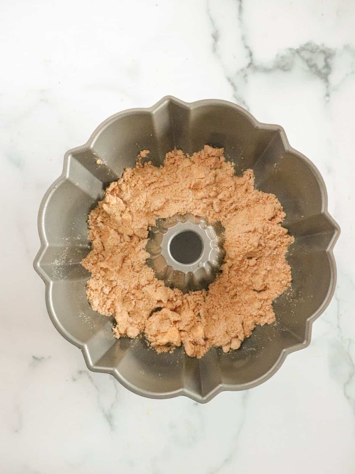crumble topping pressed into bundt pan