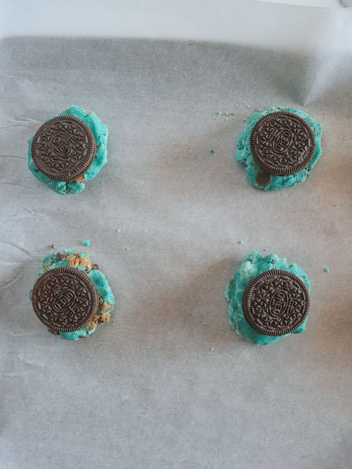 oreo placed in the center of the dough