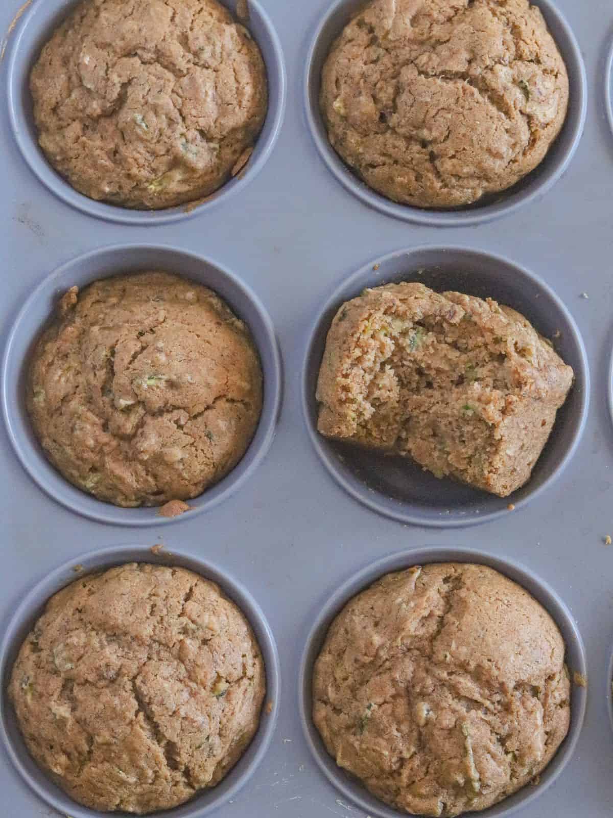filled cupcake tin with cooked bread
