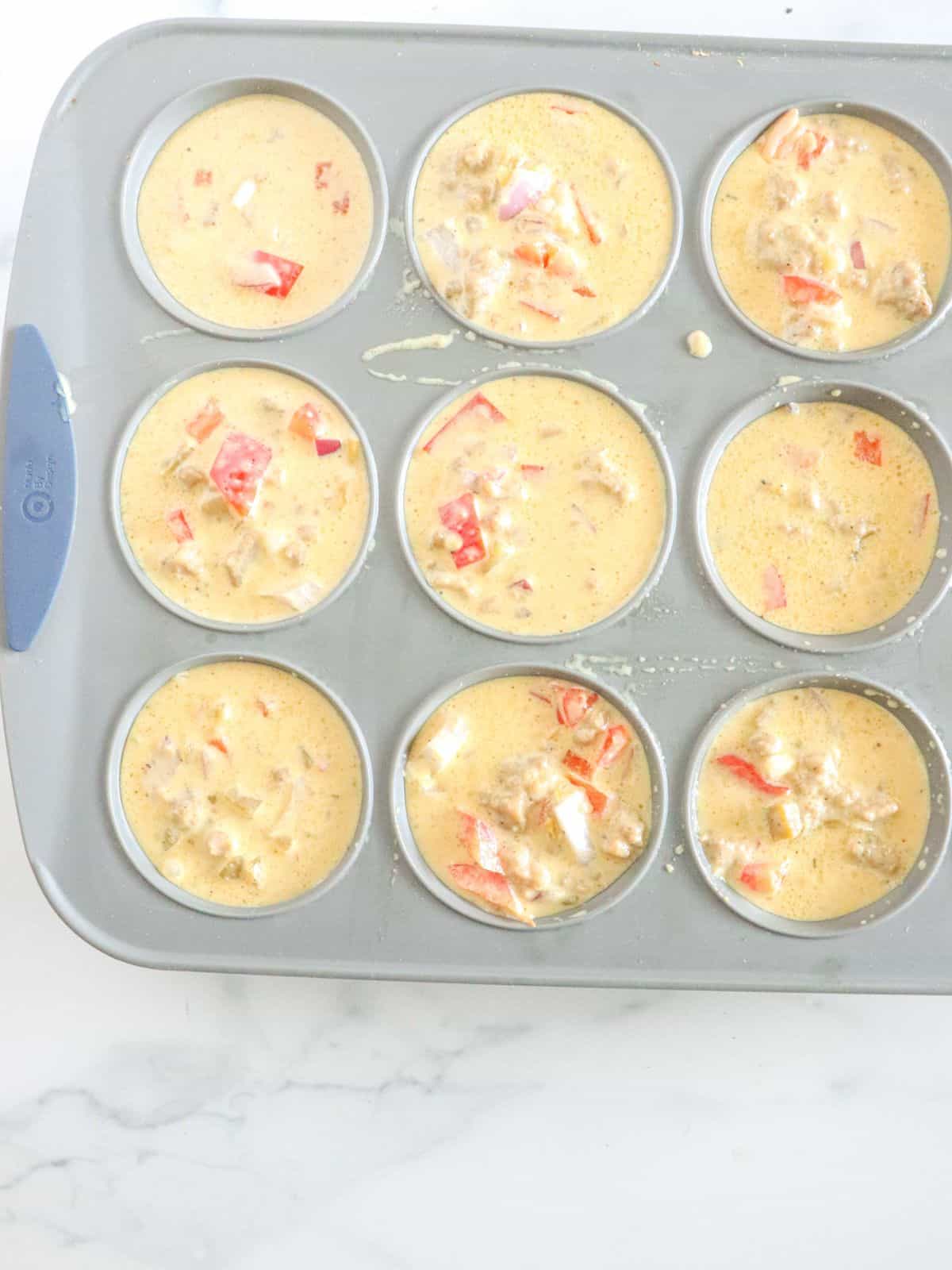 filled cupcake liners with batter